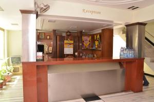 a bar in the lobby of a restaurant at Hotel Sun Rock in Kanyakumari
