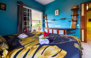 Ένα ή περισσότερα κρεβάτια σε δωμάτιο στο KAHAU Lodge