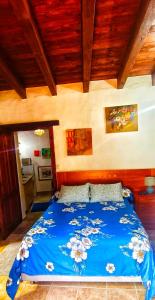 En eller flere senge i et værelse på Finca Lucía - El Pequeño Edén