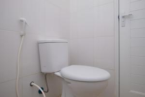 Koupelna v ubytování Sans Hotel Beskalan Malioboro