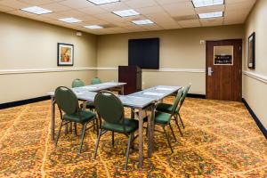 a conference room with a table and chairs at Comfort Suites Westchase Houston Energy Corridor in Houston +83 photos