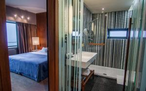Postel nebo postele na pokoji v ubytování Hotel Yasmin Košice
