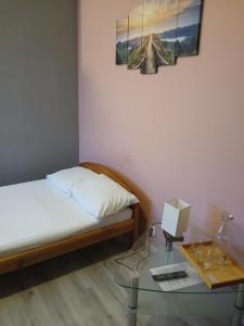 Postel nebo postele na pokoji v ubytování Dom Brama Mazur