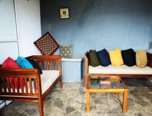 Posezení v ubytování Paradise Point Nature Cabana Kandy