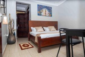 Posezení v ubytování Mirembe Hotels - Source of the Nile Suites