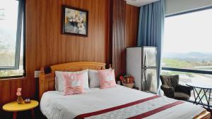 Postel nebo postele na pokoji v ubytování NEST House