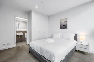 Luxurious apt In Southern Cross-Harbour Views 3B2B 객실 침대