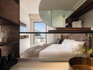 Posteľ alebo postele v izbe v ubytovaní Geraniotis Hotel and Resort