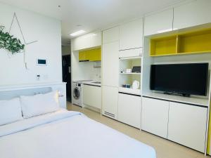 Kuchyň nebo kuchyňský kout v ubytování OceanStay E7 INN-TheCity