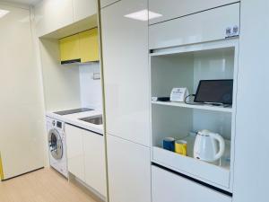 Kuchyň nebo kuchyňský kout v ubytování OceanStay E7 INN-TheCity