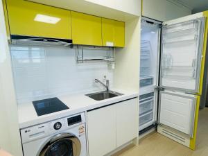 Kuchyň nebo kuchyňský kout v ubytování OceanStay E7 INN-TheCity
