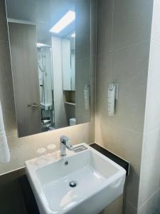 Koupelna v ubytování OceanStay E7 INN-TheCity
