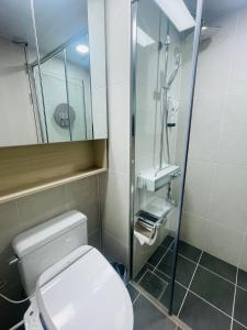 Koupelna v ubytování OceanStay E7 INN-TheCity