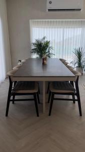 a table and chairs in a living room with a table and chairs at Moon mountain resort in Sharm +39 photos