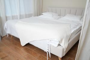 Postel nebo postele na pokoji v ubytování Bohemian