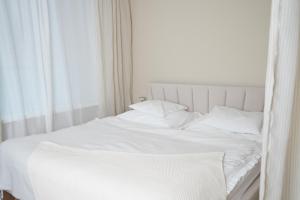 Postel nebo postele na pokoji v ubytování Bohemian