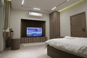 Кровать или кровати в номере Dibbah Fujairah Private farm with pool