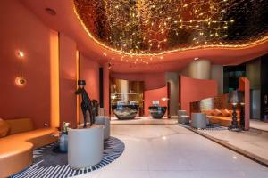 Posezení v ubytování Calvin International Hotel Guangzhou Baiyun International Airport Huadu Plaza Branch - Free Deliver Service to Guangzhou Baiyun International Airport & Free Deliver Service to Canton Fair Complex During Canton Fair Period + 37 fotografií