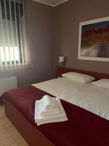 Postel nebo postele na pokoji v ubytování Motel Vespucci