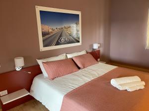 Postel nebo postele na pokoji v ubytování Motel Vespucci