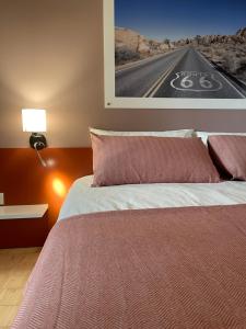 Postel nebo postele na pokoji v ubytování Motel Vespucci