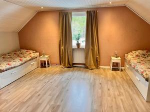 Postel nebo postele na pokoji v ubytování Villa Dalen, Natuurlijk Zweeds!