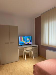 TV a/nebo společenská místnost v ubytování Motel Vespucci