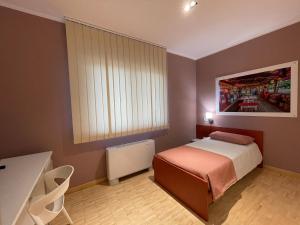 Postel nebo postele na pokoji v ubytování Motel Vespucci