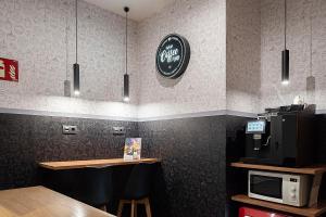 Kuchyň nebo kuchyňský kout v ubytování Woohoo Rooms Chueca