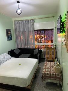 Ένα ή περισσότερα κρεβάτια σε δωμάτιο στο Emplacement idéal chambre Privée