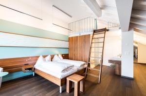 Postel nebo postele na pokoji v ubytování Superior Hotel Nidwaldnerhof + 37 fotografií