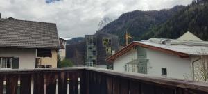 a view from a balcony of buildings and a mountain at Apartments Goller in Ortisei
