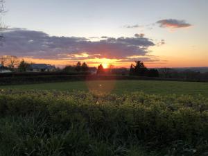Amanecer o atardecer desde la posada u hostería o alrededores