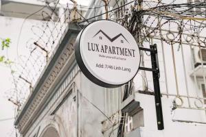 a sign for a luxury apartment on the side of a building at Lux Japan Town Studio in Hanoi +32 photos