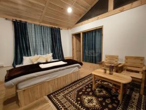 Ένα ή περισσότερα κρεβάτια σε δωμάτιο στο Shreya cozy hut +30 φωτογραφίες