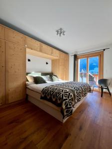 Postel nebo postele na pokoji v ubytování 3 bedroom Modern Alpine Escape