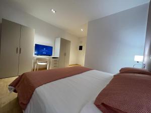 Postel nebo postele na pokoji v ubytování Motel Vespucci