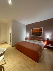 Postel nebo postele na pokoji v ubytování Motel Vespucci