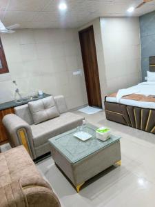 Postel nebo postele na pokoji v ubytování Soooper Hotel
