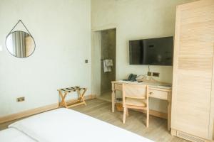 TV a/nebo společenská místnost v ubytování Tuta Agrotourism