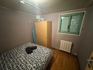 Ένα ή περισσότερα κρεβάτια σε δωμάτιο στο La petite condemine