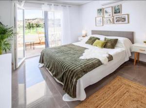 Ένα ή περισσότερα κρεβάτια σε δωμάτιο στο Olé studio Apartment
