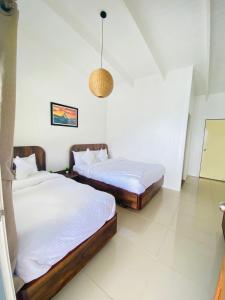Postel nebo postele na pokoji v ubytování Cooee Himalaya Resort & Spa
