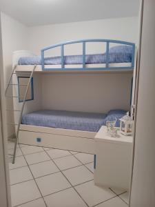 A bed or beds in a room at Angolo di Grecia