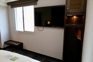 Sjónvarps- og/eða afþreyingartæki á Hub Hotel - Zhongshan Branch