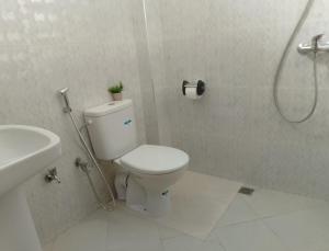 Koupelna v ubytování appartement de vacance Aourir2 + 14 fotografií