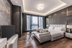 Posezení v ubytování Roosevelt Service Apartment Chongqing Jiefangbei Pedestrian Street Hongyadong Branch
