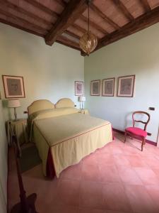 Ένα ή περισσότερα κρεβάτια σε δωμάτιο στο Casa Limonaia a Perugia