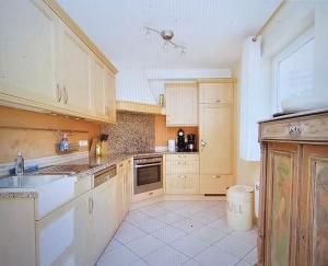 Kuchyň nebo kuchyňský kout v ubytování Chalet Hutberg Luxe Family ski home + 13 fotografií