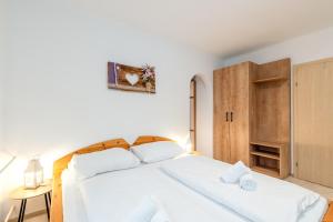Postel nebo postele na pokoji v ubytování Matzling Apartment - by myNests
